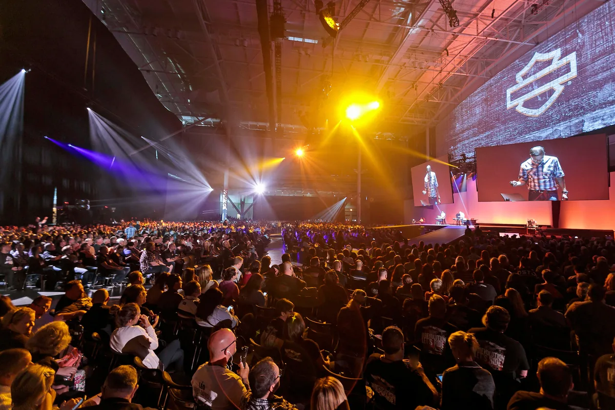 A packed audience at a Proscenium-produced live show